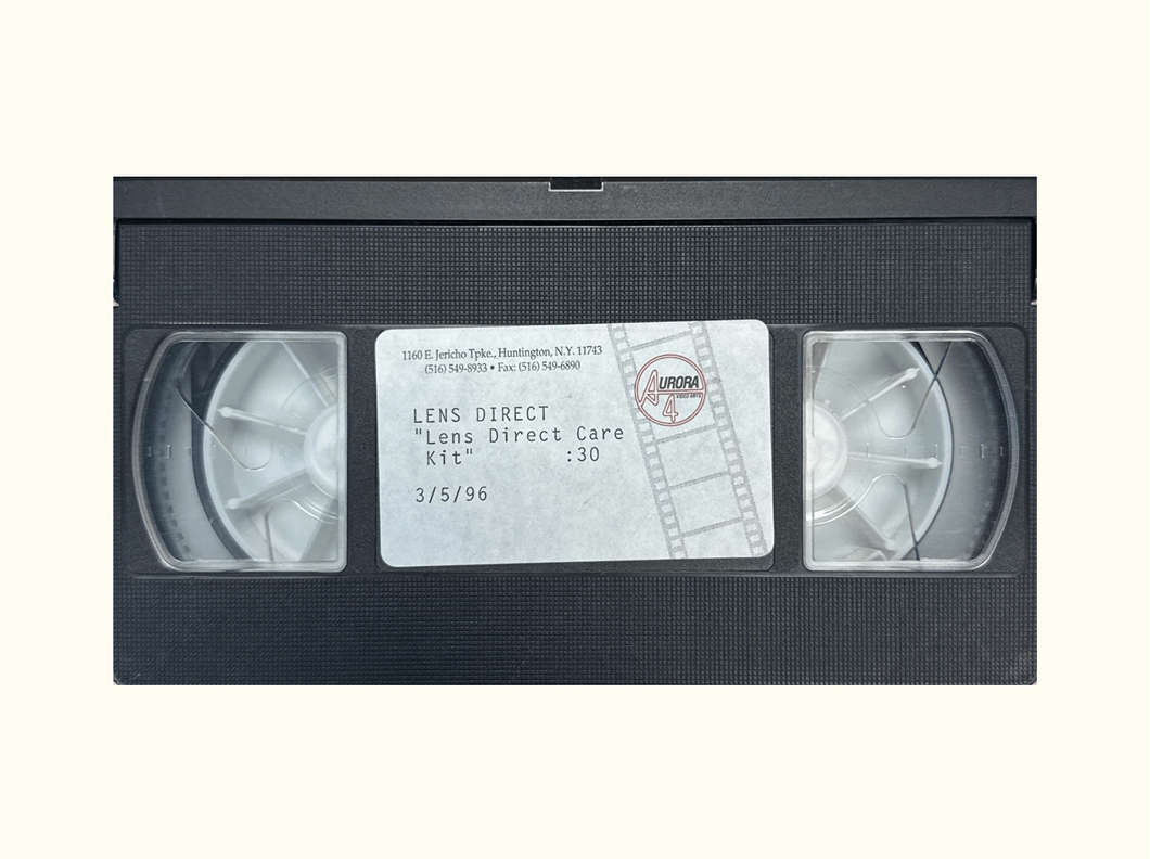 A VHS tape labelled “Lens Direct — Lens Direct Care Kit”, dated March 1996.