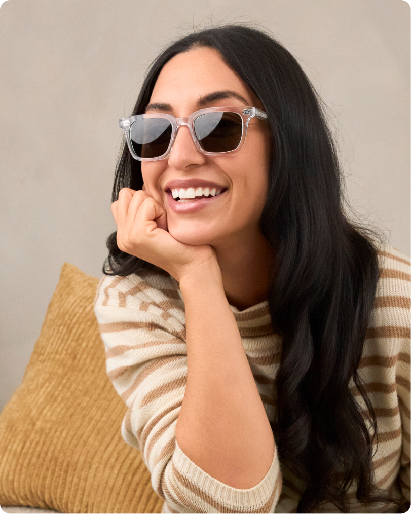 Smiling woman wearing clear Fordham sunglasses