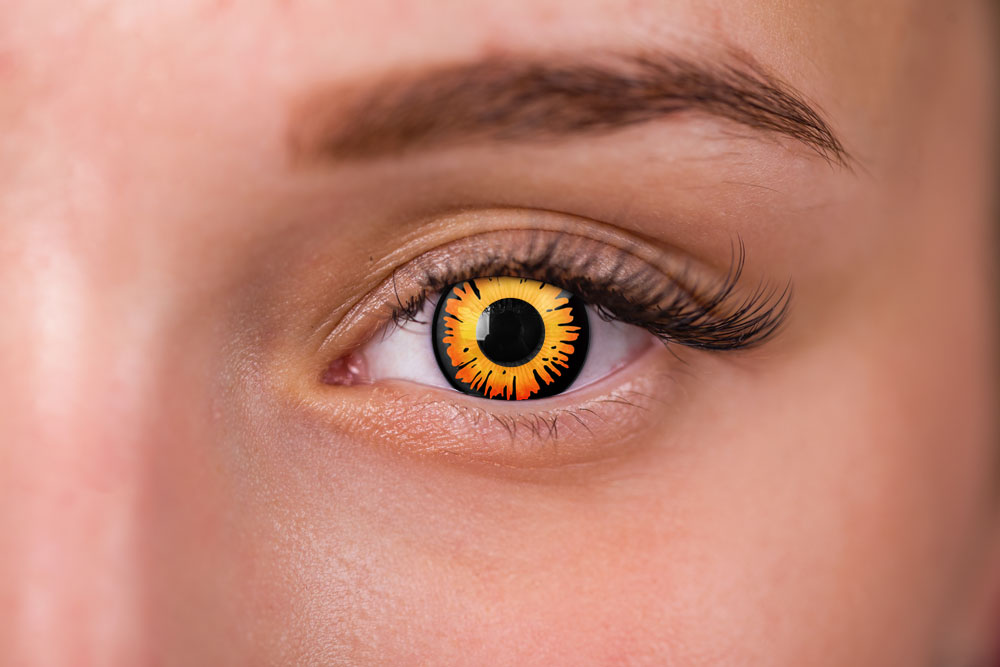 Woman Wearing Orange and Black Contacts woman wearing orange and black contacts