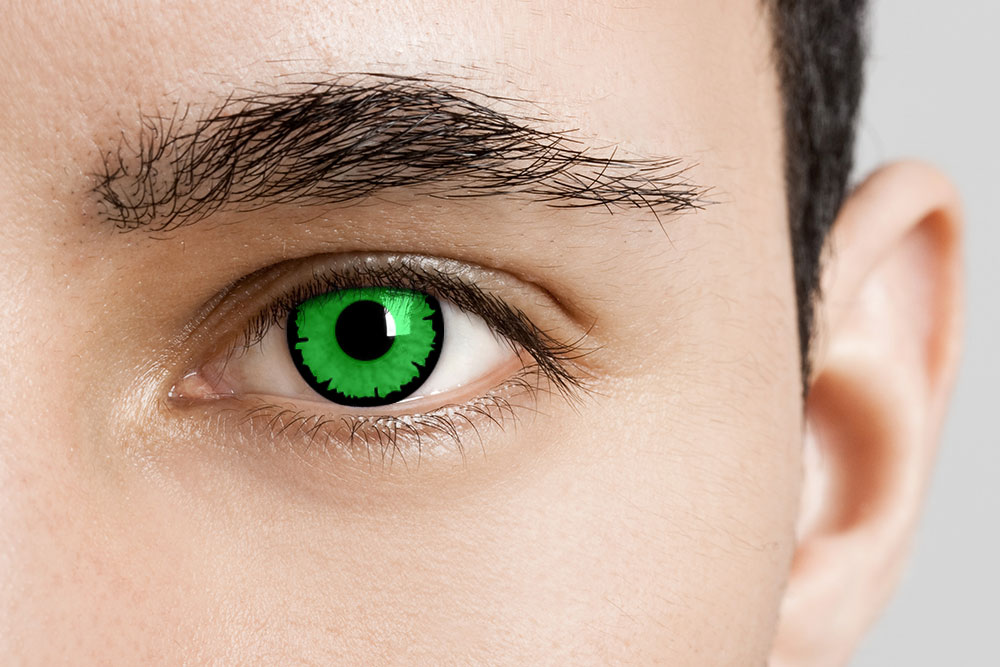man wearing angelic green circle contact lenses