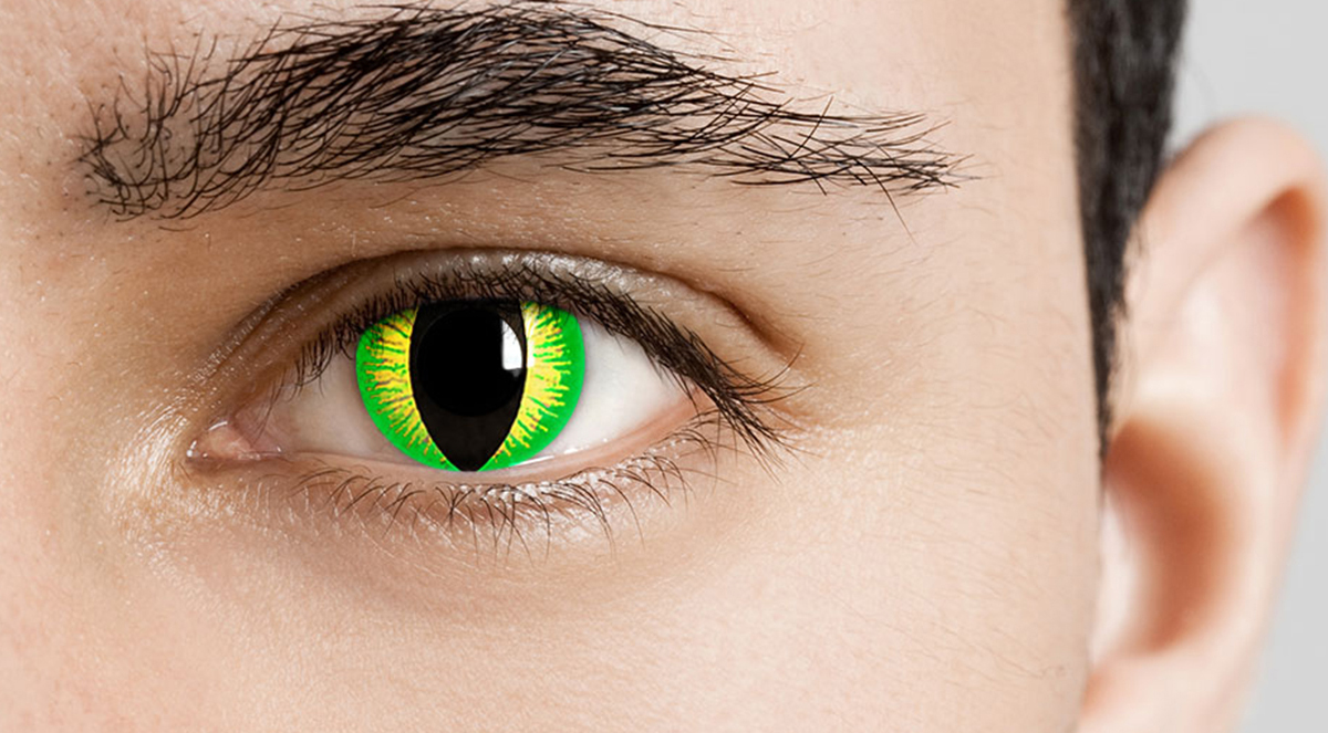 man wearing green reptile contacts